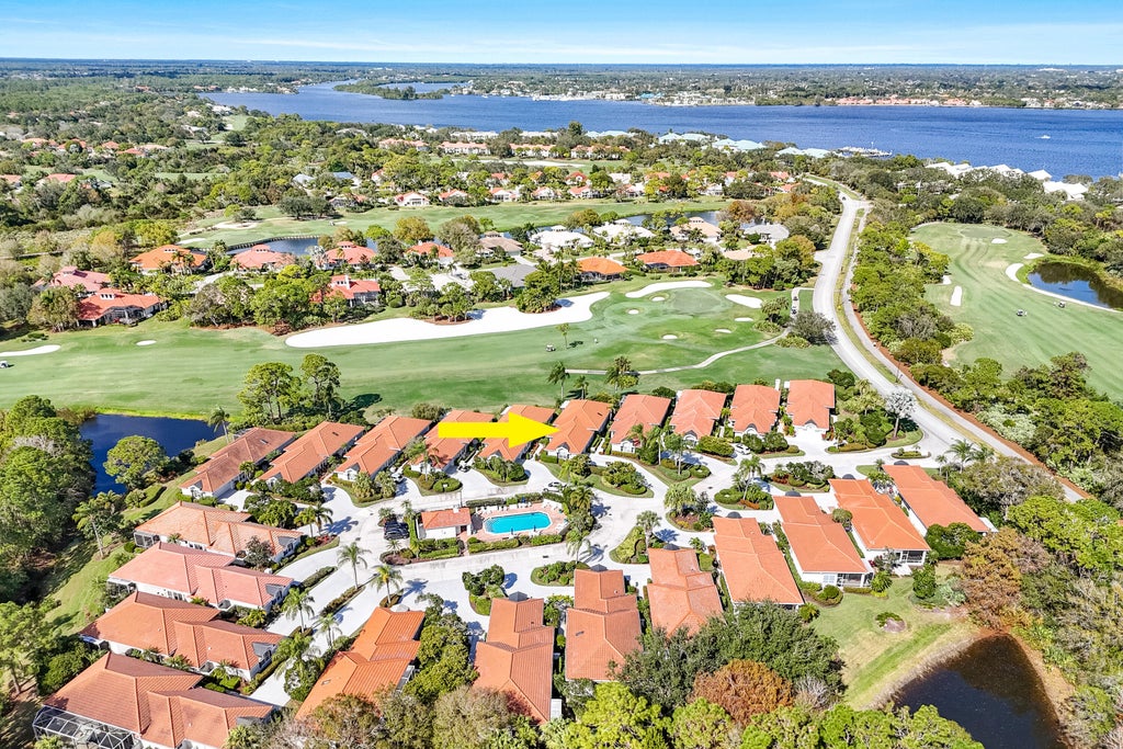 Photo of 13008 Harbour Ridge Boulevard, Palm City, FL 34990 (MLS # B26073687)