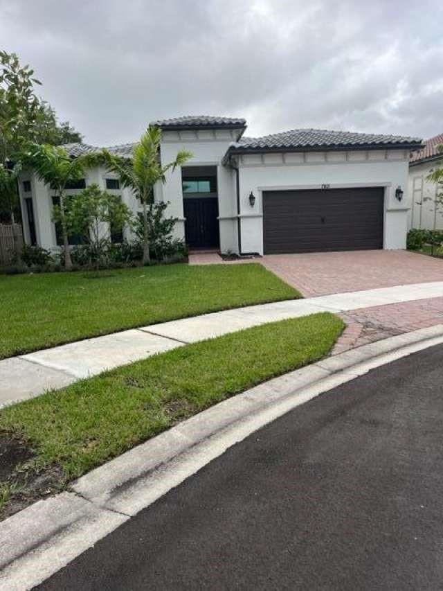 Live the best years of your life in this stunning 3-bed 3.5-bath home in the upscale and vibrant gated 55+ community of The Falls at Parkland. The home features a grand foyer with volume ceiling, impact doors and windows, custom electric blinds, tiles throughout, gourmet kitchen with cooking island, huge pantry, living room and dining room overlooking the serene lake, large covered patio perfect for entertainment, 2-car garage. Primary bedroom with sitting area, bathroom with dual sink, and extra large walk-in closet. Enjoy the spacious backyard on an oversized lot in a quiet cul-de-sac. Amazing amenities: Clubhouse with theater, card rooms, billiard room, ballroom, café, fitness center; pool & spa with BBQ area; pickleball & bocce.