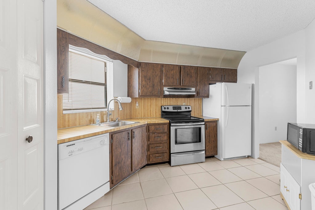Photo of 6555 W BROWARD Boulevard #409, Plantation, FL 33317 (MLS # B26065473)
