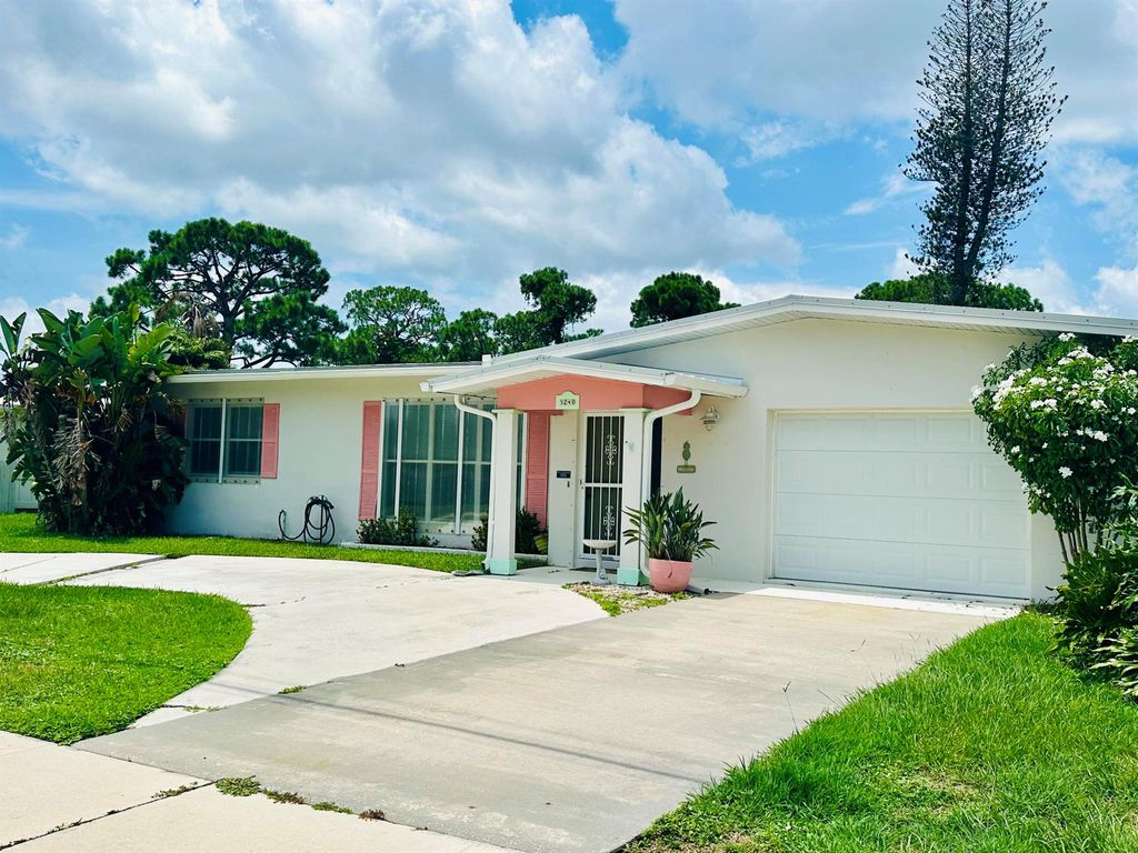 Photo of 3240 SE Monte Vista Street, Port Saint Lucie, FL 34952 (MLS # R11010787)