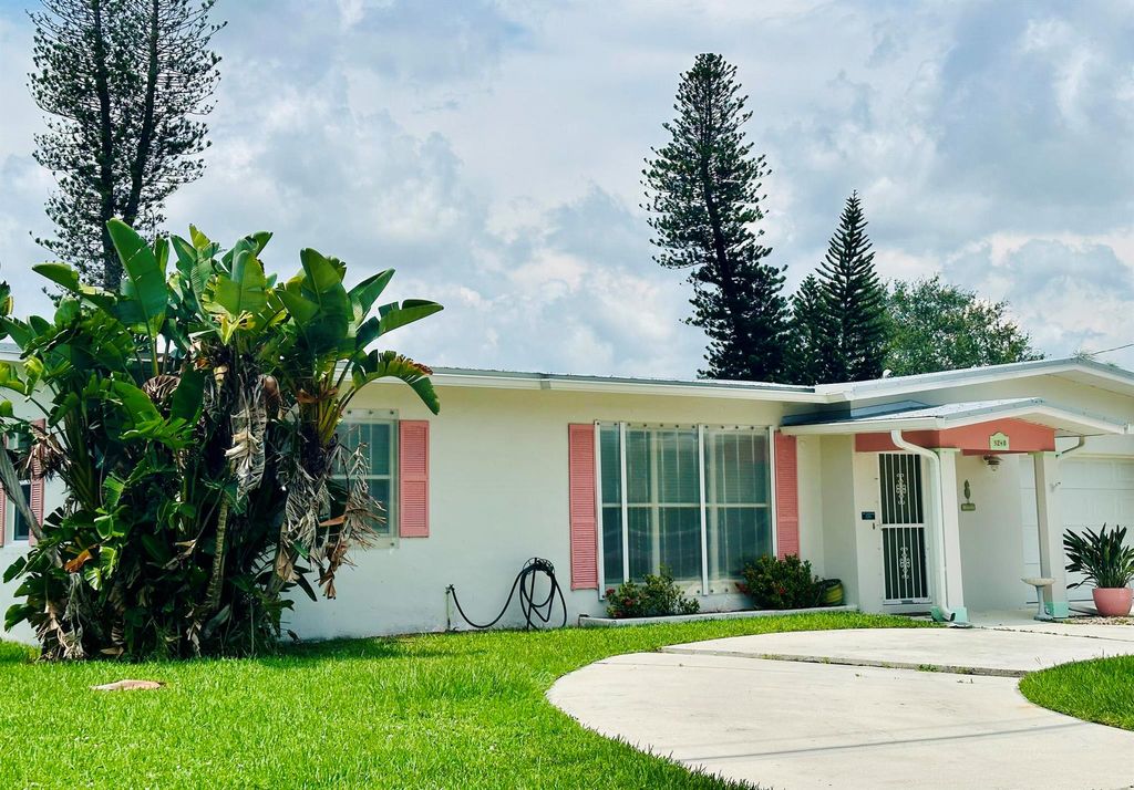 Photo of 3240 SE Monte Vista Street, Port Saint Lucie, FL 34952 (MLS # R11010787)