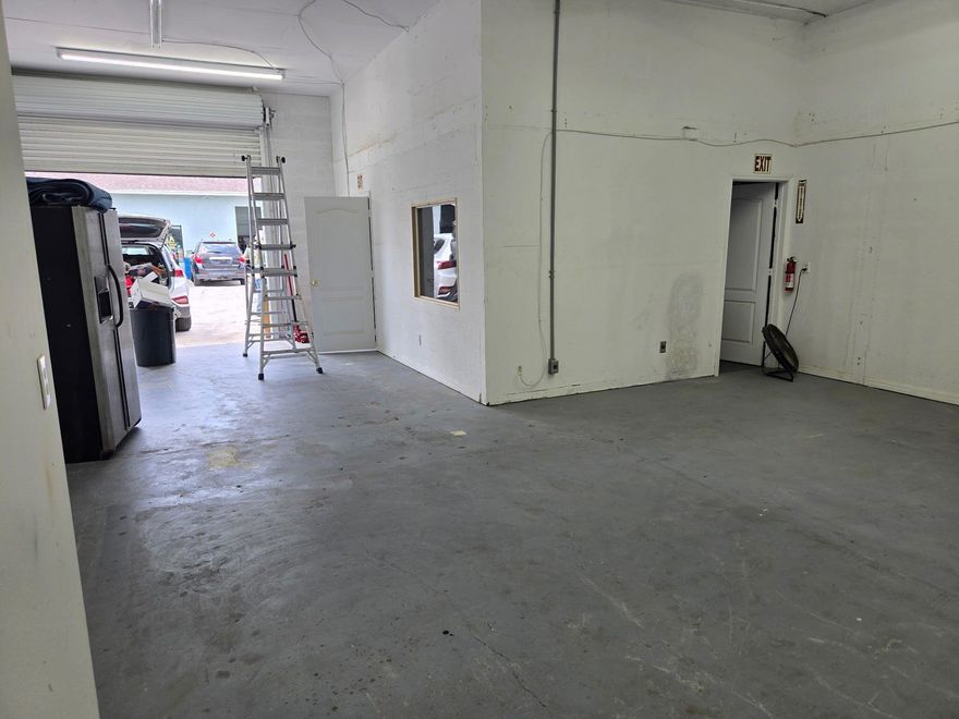 Office/warehouse space-small office, restroom and the rest is open warehouse. One roll up door in front of the unit.