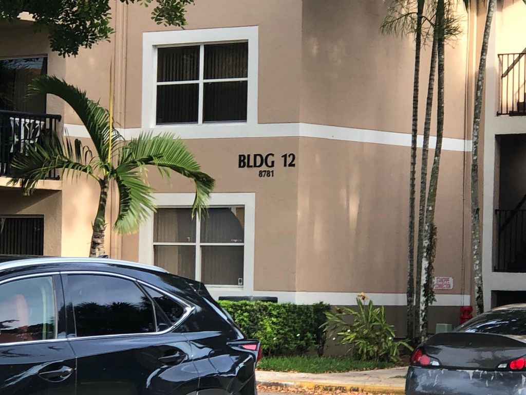 Photo of 8781 Wiles Road #201, Coral Springs, FL 33067 (MLS # F10451339)