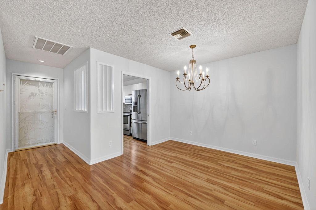 Photo of 6101 SE Landing Way #11, Stuart, FL 34997 (MLS # B26041995)