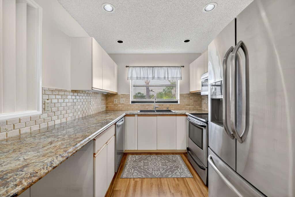 Photo of 6101 SE Landing Way #11, Stuart, FL 34997 (MLS # B26041995)