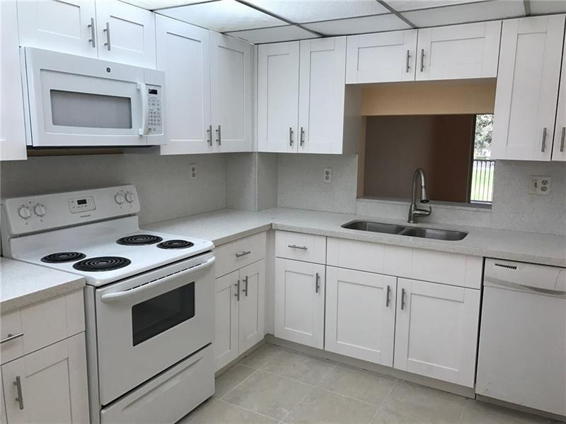 SHERWOOD SQUARE CONDOMINI - Residential Lease