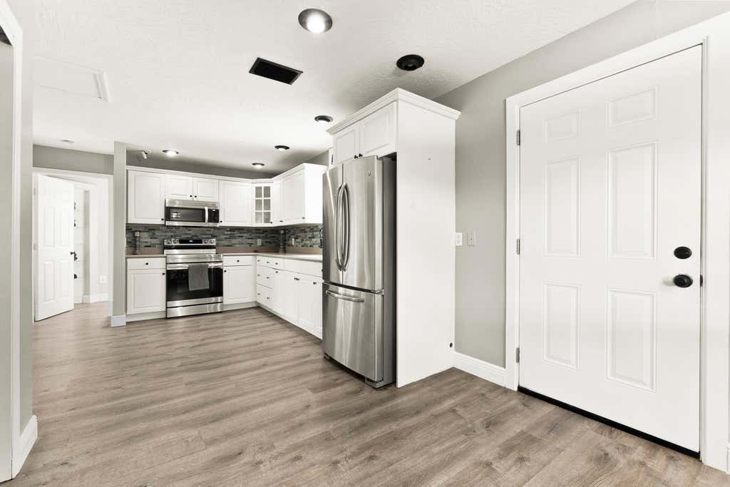 Photo of 8795 Jay Gardens Lane, Fort Pierce, FL 34945 (MLS # R10772796)