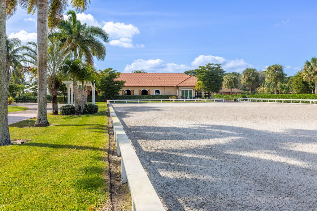 Photo of 14943 Paddock Drive, Wellington, FL 33414 (MLS # B26029117)