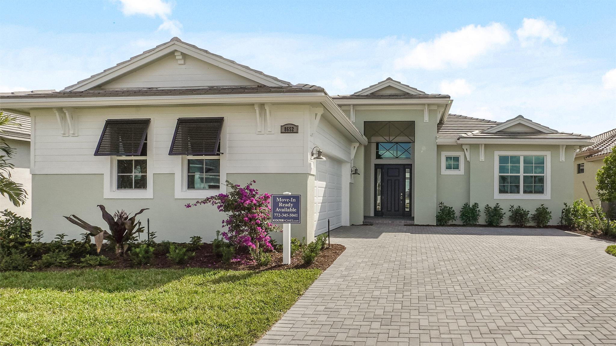**New Construction** This west exposure Riley lakeview home features 3 Bedroom, a Study, 3 Full Baths, and 1 Half Bath. It includes a Great Room, a Snore Room, a Lanai, and a 2-car garage. The Kitchen boasts a 30'' GE Profile cooktop, a pro-style canopy hood, a built-in microwave and oven, 42'' upgraded white cabinets, quartz countertops, and a subway tile backsplash. Additional kitchen features include laminate wood flooring, under cabinet lighting, and a stainless steel single bowl undermount sink. The home also offers a summer kitchen, a frameless shower in the owner's bath, and upgraded recessed lighting in the Great Room and Owner's Bedroom. Quartz finishes throughout the home, and the garage features an epoxy floor.