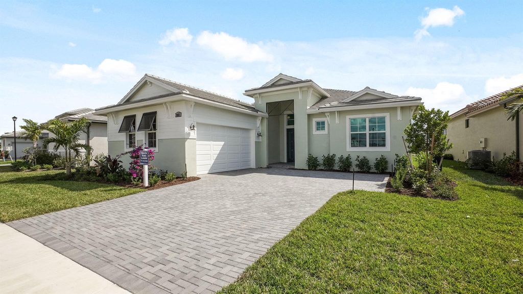 Photo of 8652 SW Cantante Way, Port Saint Lucie, FL 34987 (MLS # R11102946)