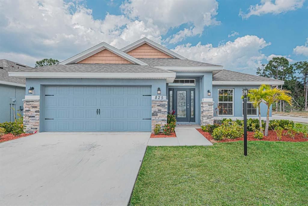 Photo of 825 NE Whistling Duck Way, Port Saint Lucie, FL 34983 (MLS # R10730878)