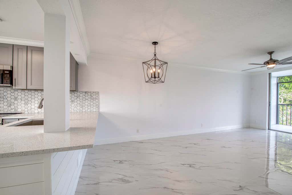 Photo of 6795 Huntington Lane #406, Delray Beach, FL 33446 (MLS # B26058644)