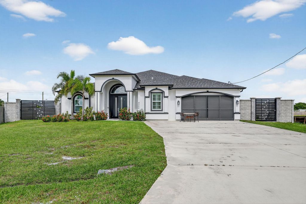 Photo of 4300 SW Attlee Street, Port Saint Lucie, FL 34953 (MLS # R11136469)