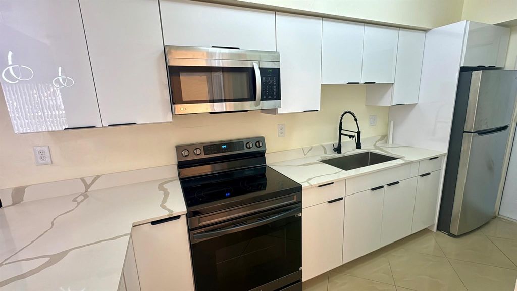 Photo of 4039 Coral Springs Drive #10, Coral Springs, FL 33065 (MLS # F10496063)