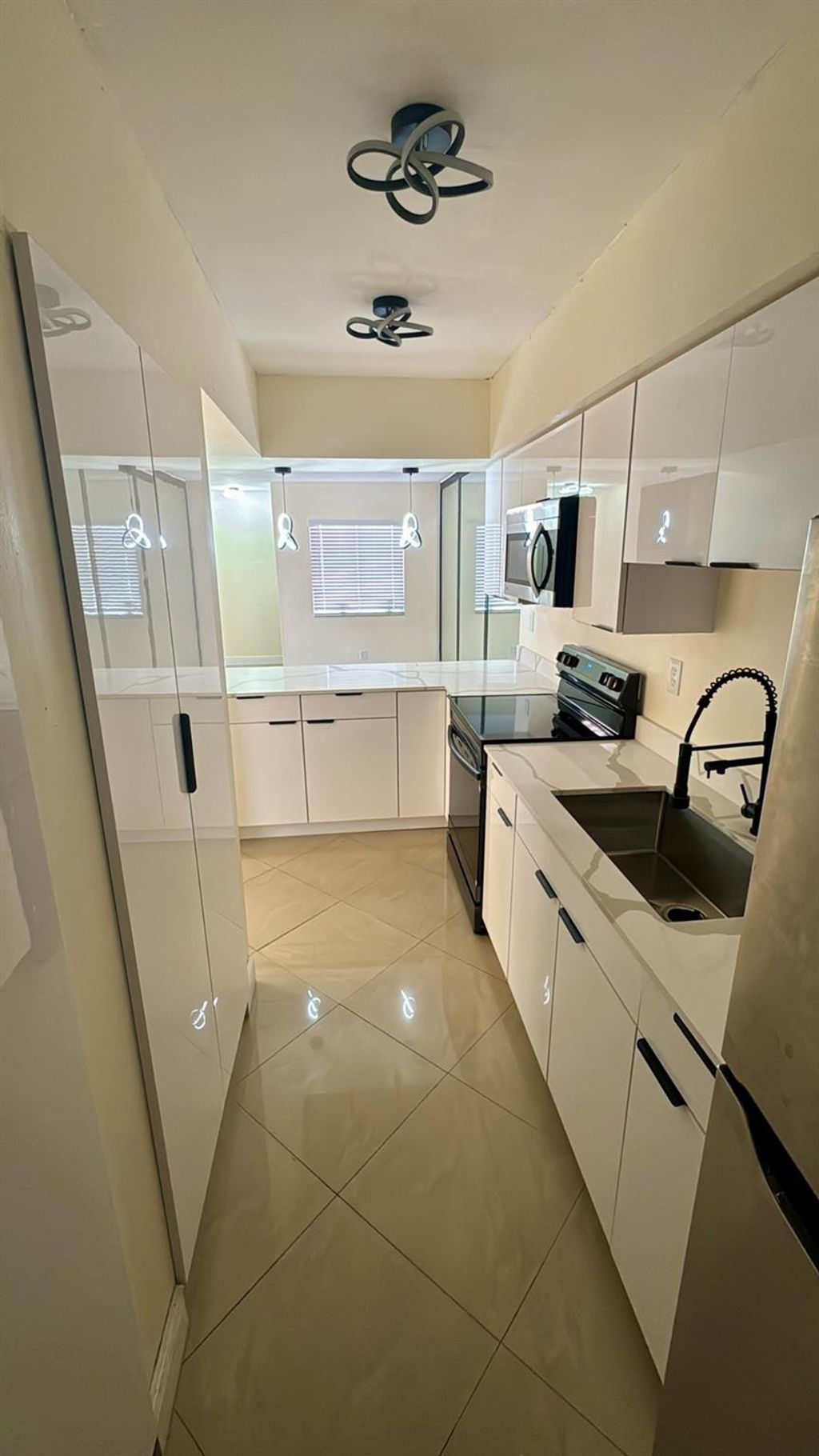 Photo of 4039 Coral Springs Drive #10, Coral Springs, FL 33065 (MLS # F10496063)