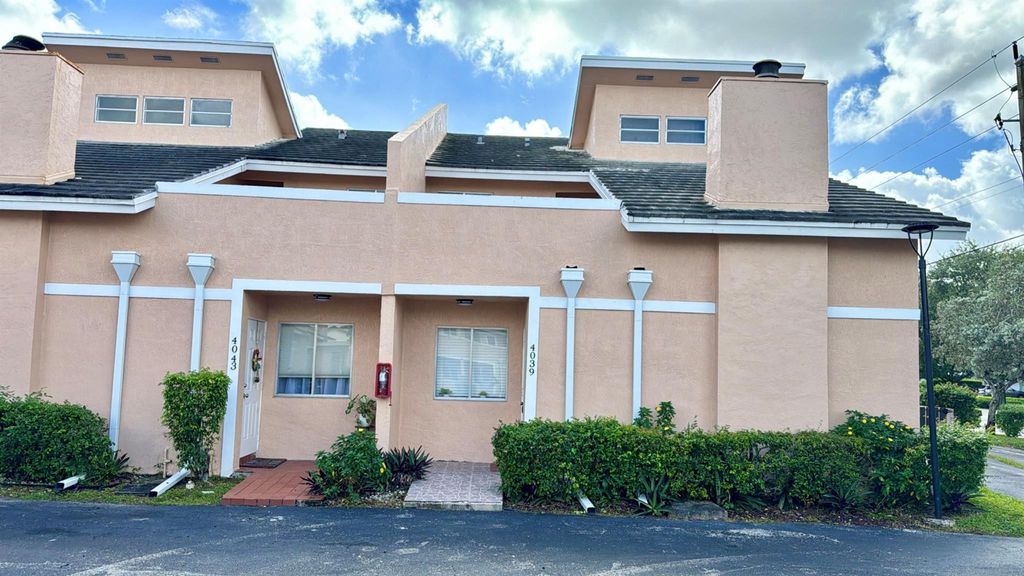 Photo of 4039 Coral Springs Drive #10, Coral Springs, FL 33065 (MLS # F10496063)
