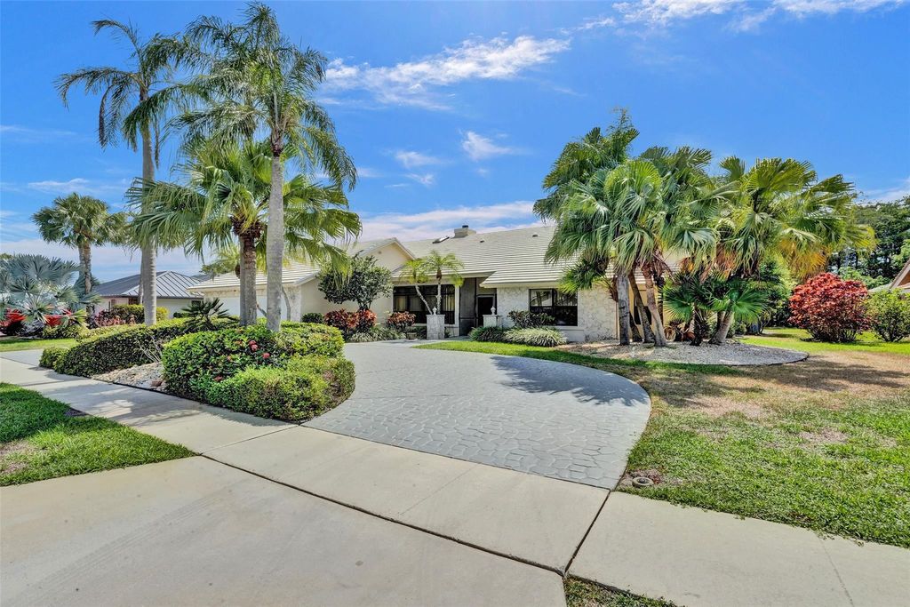 Photo of 10595 Boca Woods Ln, Boca Raton, FL 33428 (MLS # F10443333)