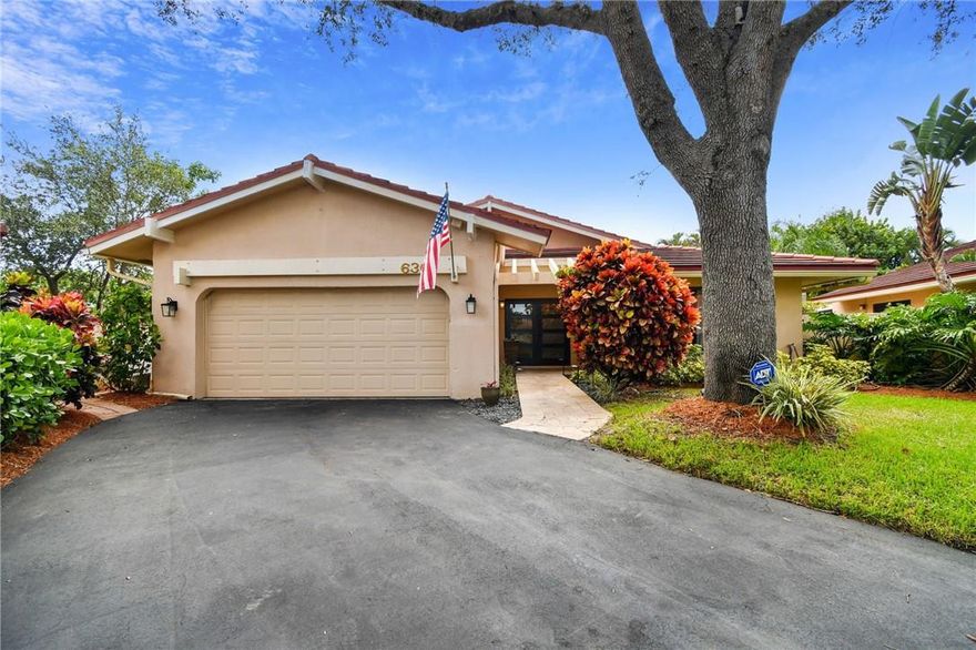 Absolutely gorgeous remodeled 2 bed, 2 bath SF home w/2 car garage in the prestigious Deer Creek Golf Community. Pride of ownership, this home has it all! Wood look tile floors throughout living areas & primary bedroom, new baseboards, crown molding in bedrooms. Light & bright with clerestory windows, impact/energy efficient windows & doors, all popcorn removed. Updated open kitchen with granite counters, warm wood soft close cabinets & drawers, SS appliances. Primary suite has been fully renovated w/gorgeous spa like bathroom, large frameless walk in shower, custom walk in closet. Split bedroom plan, large second bedroom, updated guest bath. Pool & patio area completely renovated including new travertine pool deck, energy efficient pool pump & heater. A/C & all ductwork replaced 2020.