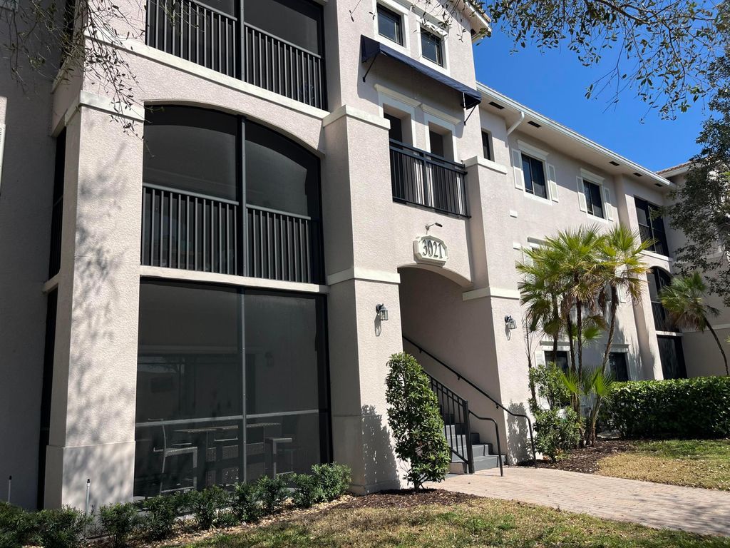 Photo of 3021 Alcazar Place #103, Palm Beach Gardens, FL 33410 (MLS # R11167428)