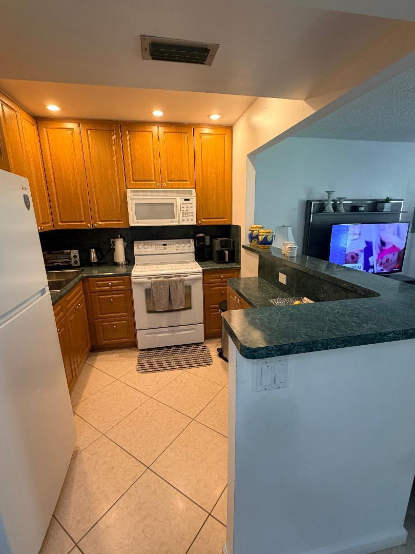 SNUG HARBOR GARDENS CONDO - Residential Lease