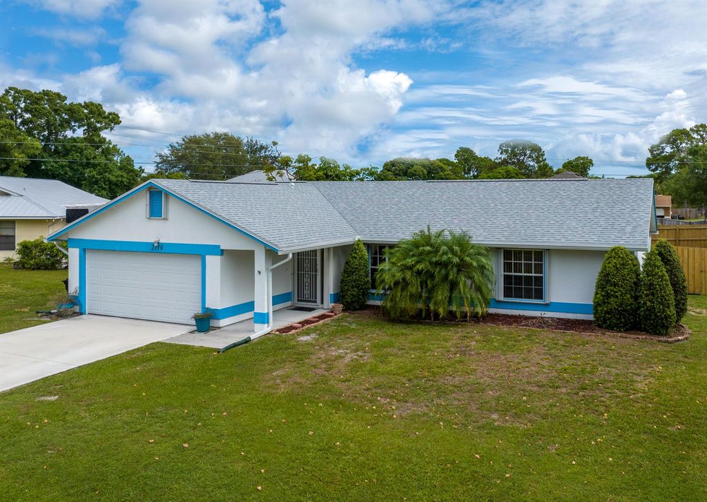 Photo of 2719 SE Helms Avenue, Port Saint Lucie, FL 34952 (MLS # R11103840)