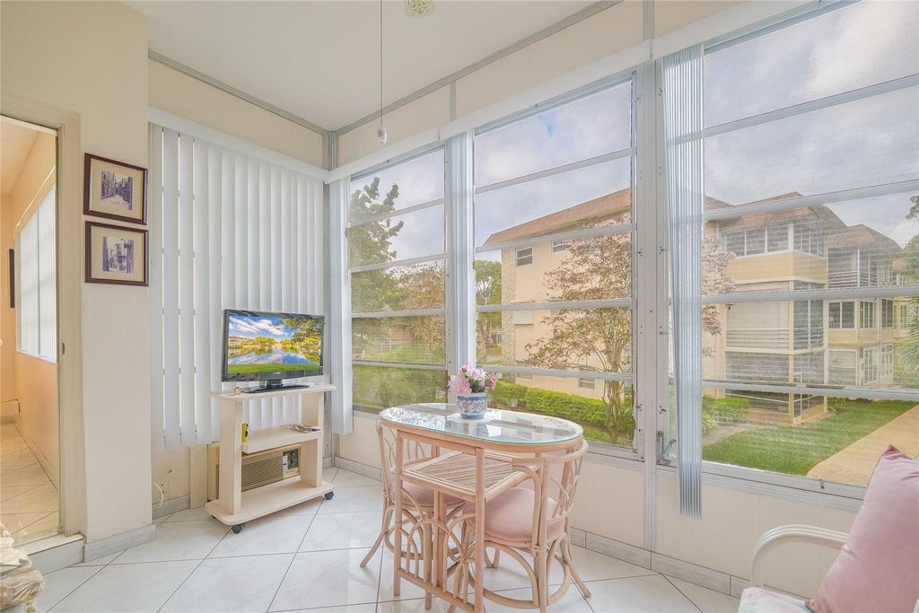 Photo of 3431 NW 50th Ave #213, Lauderdale Lakes, FL 33319 (MLS # B26001028)