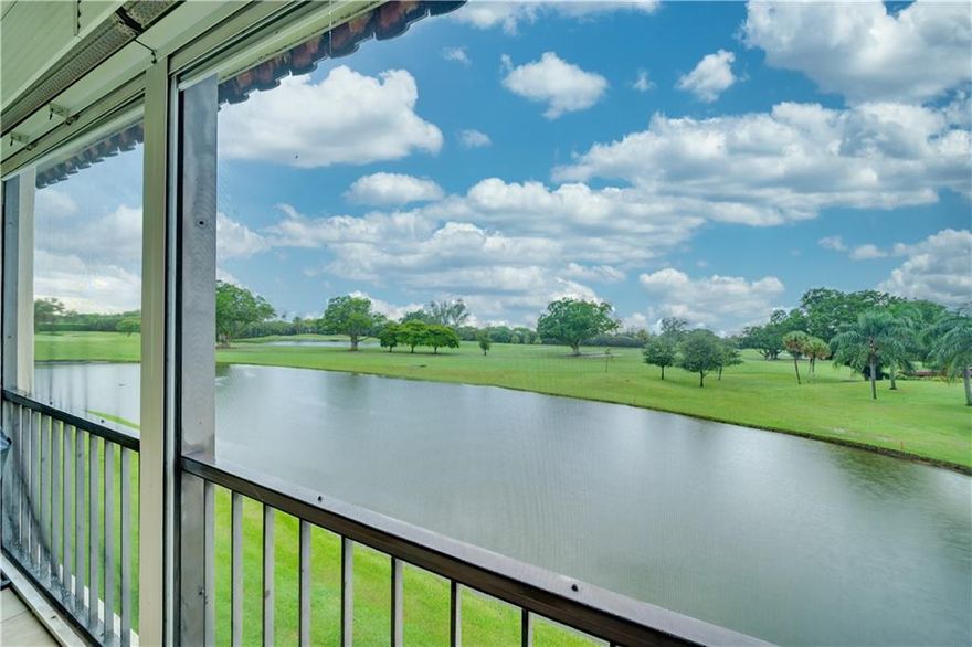 Large Bright Corner Condo With Lake and PGA Golf Course Views-Fully Equipped Turn Key Unit-Has Washer and Dryer-Wood Flooring Throughout-All Windows Are Upgraded For Storm Protection-Upgraded White Kitchen WithLarge Granite Island-Both Bathroom Are Upgraded-Two Full Bedrooms With Walk In Closets-Tastefully DecoratedAnd Furnished-Rec Lease Paid In Full-May Have One Pet To 20 Lbs.-Steps To Pool and Parking-Community is 55+Free Golf-14 Tennis Courts-7 Pools-Fitness Center-Restaurant-Theater-24 Hr. Security Patrol-Assoc. RepresentsHousing For Older Persons Authorized (HOPA) Please see Broker Remarks Before Showing.