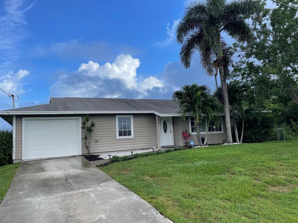Photo of 341 SW Feldman Avenue, Port St Lucie, FL 34953 (MLS # R10895443)
