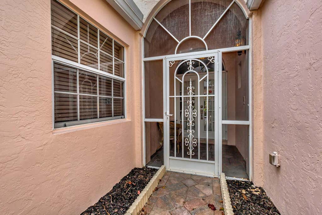 Photo of 108 Egret Circle, Greenacres, FL 33413 (MLS # R11026091)