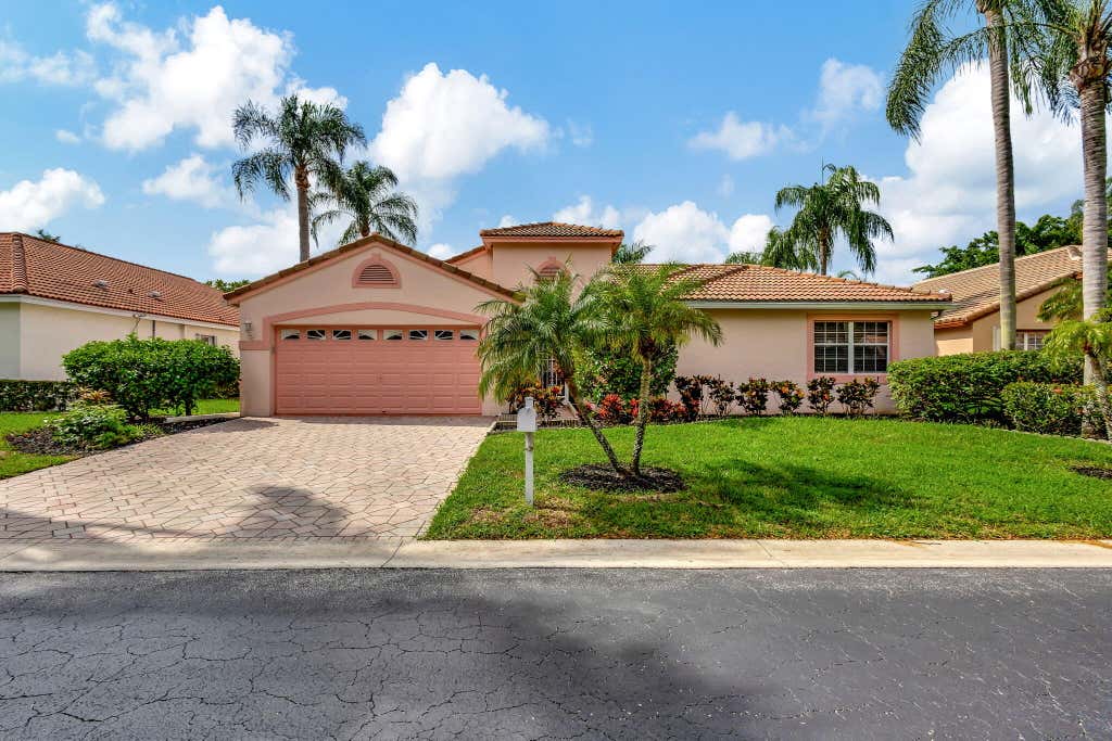 Photo of 108 Egret Circle, Greenacres, FL 33413 (MLS # R11026091)