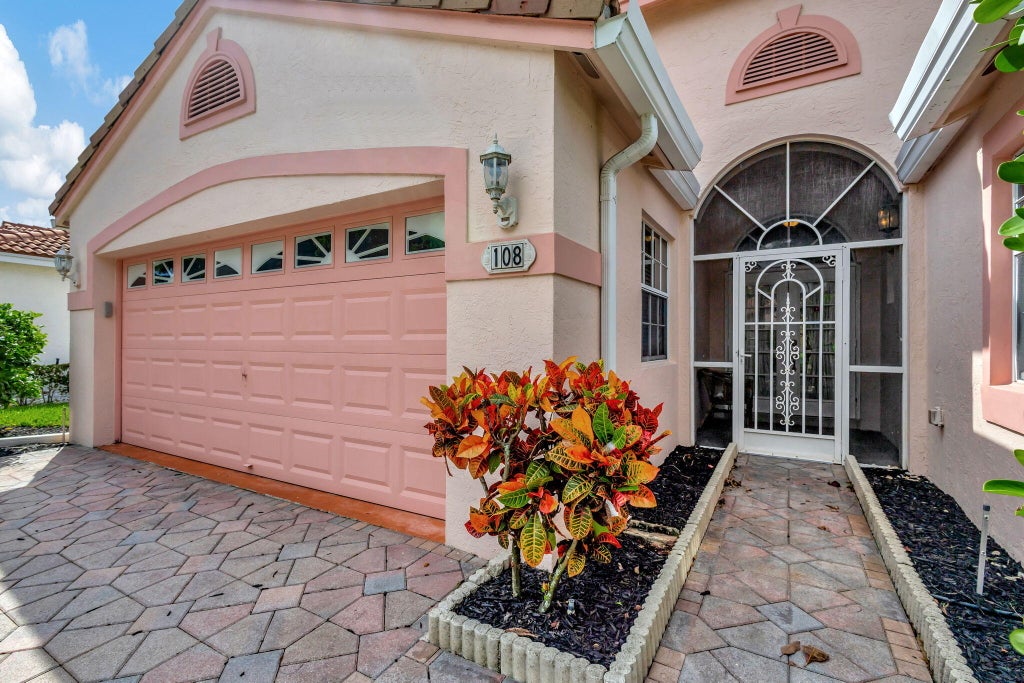 Photo of 108 Egret Circle, Greenacres, FL 33413 (MLS # R11026091)