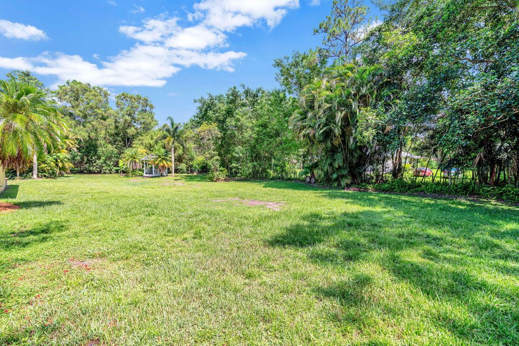 Photo of 17590 133rd Trail N, Jupiter, FL 33478 (MLS # R11001823)