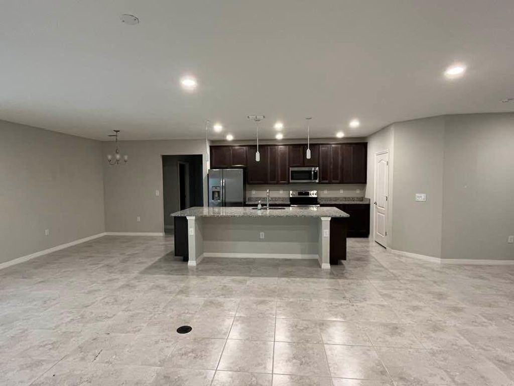 Photo of 977 SW Nichols Ter, Port Saint Lucie, FL 34953 (MLS # R11065667)