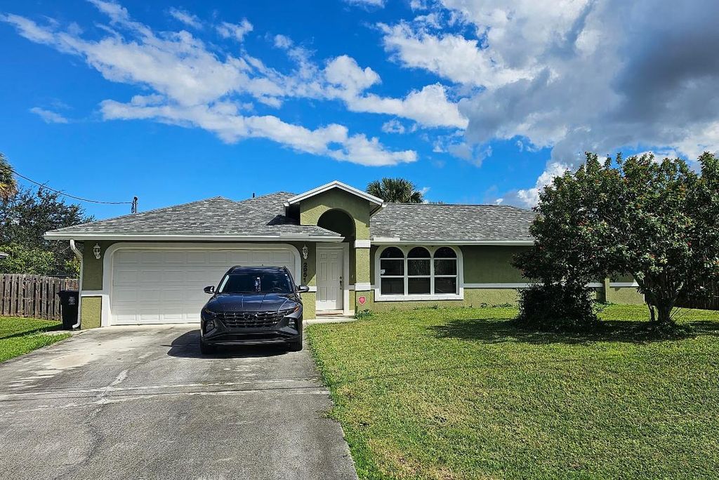 Photo of 2951 SW Romano Road, Port Saint Lucie, FL 34953 (MLS # R10928704)