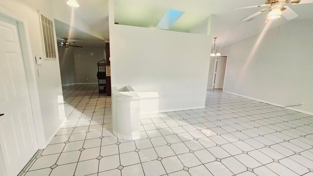 Photo of 2951 SW Romano Road, Port Saint Lucie, FL 34953 (MLS # R10928704)