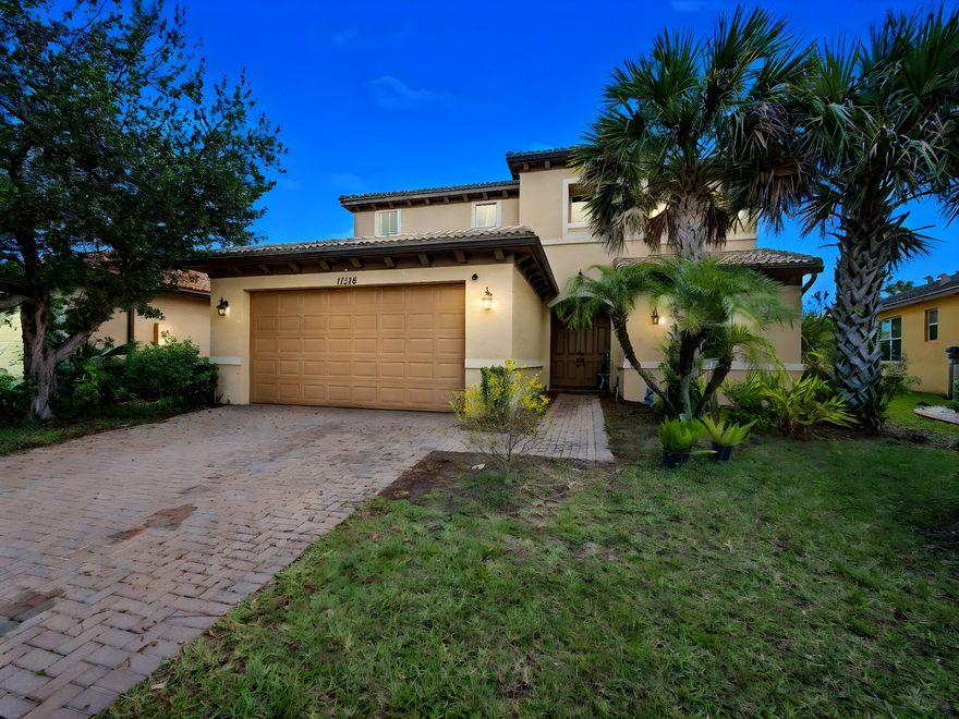 Experience refined living in this beautifully designed Berkley Model home located in the highly sought-after community of TownPark at Tradition. Offering 4 bedrooms, 2.5 bathrooms, and a thoughtfully designed layout, this residence blends comfort, functionality, and style in one of Port St. Lucie's premier gated communities. Step inside to discover a spacious open-concept floor plan ideal for both everyday living and entertaining. The home features bright and inviting living and dining areas, complemented by thoughtful upgrades throughout. The kitchen offers ample cabinetry and counter space, seamlessly connecting to the main living areas. Recent enhancements add both comfort and efficiency, including a new, water-efficient half bath toilet (installed 6 months ago), along with an updated mirror and added wall shelving. New light/fan fixtures have been installed in both the downstairs bedroom and one of the upstairs bedrooms, enhancing both style and functionality. Custom storage solutions include a built-out closet in the secondary bedroom and a custom-designed, oversized walk-in closet in the primary suite, offering exceptional organization.  Upstairs, the primary suite serves as a relaxing retreat, while two additional bedrooms provide flexibility for guests, a home office, or additional living space. The garage is equipped with built-in shelving units, providing convenient storage.  Enjoy outdoor living in the fully fenced backyard, enclosed with a durable bronze aluminum fence and featuring two locking 4-foot gates for easy access, ideal for both privacy and functionality.  As a resident of TownPark at Tradition, you'll enjoy access to resort-style amenities including a clubhouse, fitness center, pool, tennis courts, and more—all within a beautifully maintained gated setting. Conveniently located near shopping, dining, and the renowned Cleveland Clinic Tradition Hospital, this home offers the perfect combination of comfort, upgrades, and location.