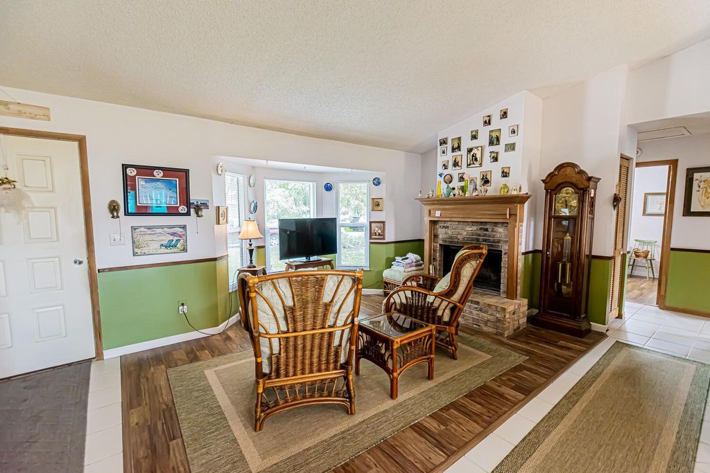 Photo of 1377 SW Axtell Avenue, Port Saint Lucie, FL 34953 (MLS # R10955530)