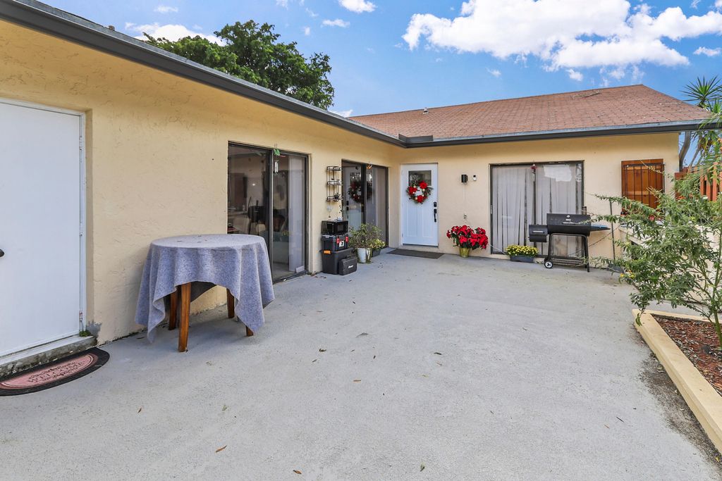 Photo of 1040 Summit Place Circle #A, West Palm Beach, FL 33415 (MLS # R11149236)