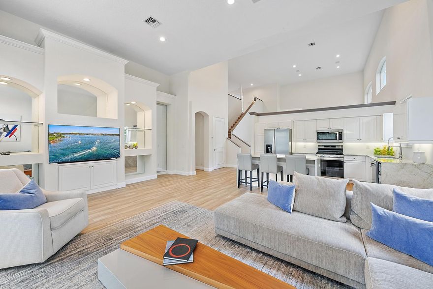 Located just 500 feet from the world-class amenities of the award-winning Club at Ibis, this beautifully renovated and spacious home is available for the upcoming season. Offering more than 2,900 sq. ft. of living space, this 3BR/3.5BA + Den + Loft residence features soaring ceilings, oversized rooms, and ensuite bedrooms for complete comfort and privacy. With a southern exposure, the home is filled with natural light and the heated pool enjoys sun throughout the day with serene water views as your backdrop.Renovated in 2021, the home includes new quartz countertops and backsplash, glossy white upper cabinets, new kitchen appliances, updated flooring on the main level, and fresh interior paint throughout. Additional updates include new faucets, lighting, hardware, and trim.