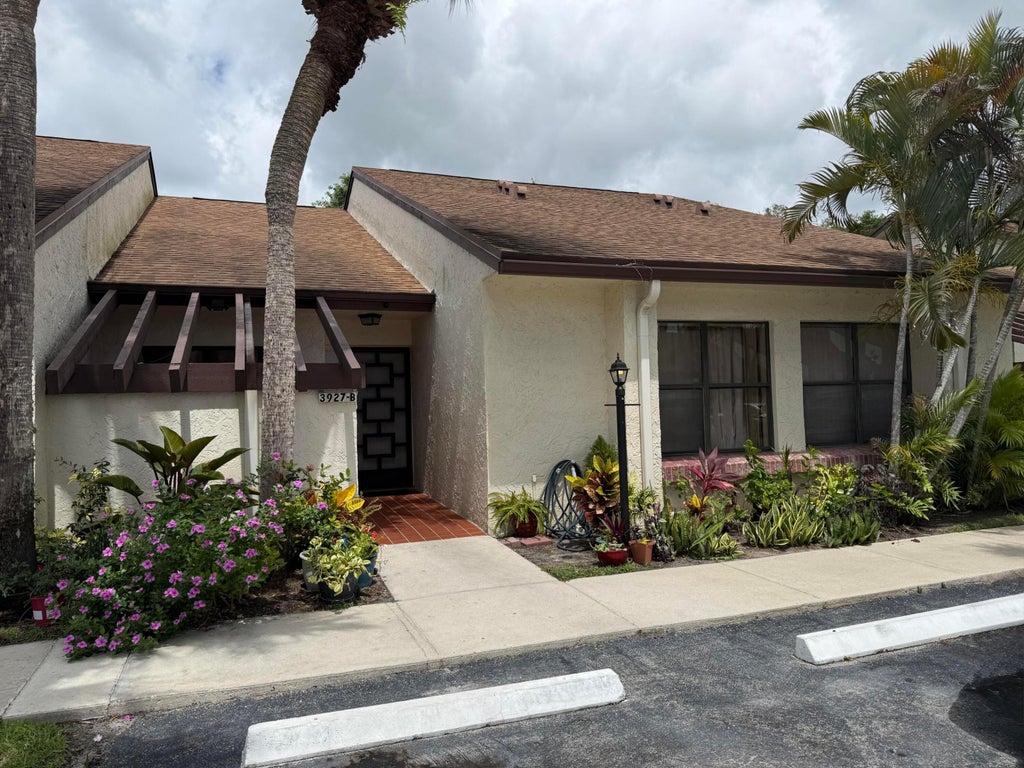 Photo of 3927 Vine Tree Trail #B, Lake Worth, FL 33467 (MLS # B26037866)