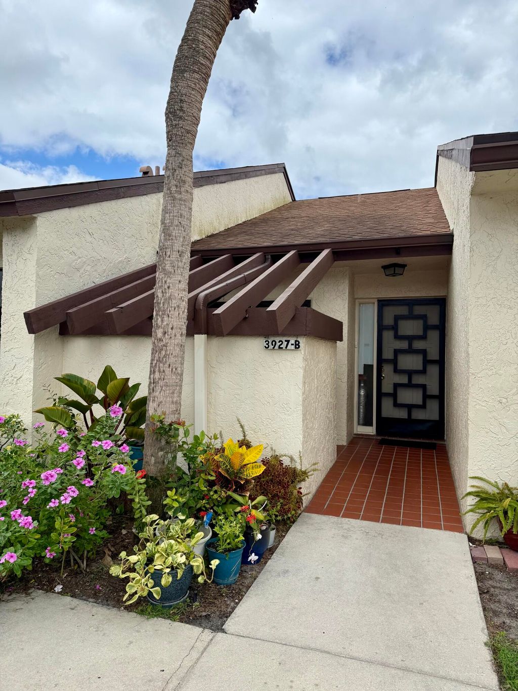 Photo of 3927 Vine Tree Trail #B, Lake Worth, FL 33467 (MLS # B26037866)