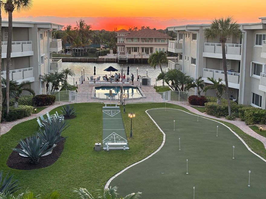 Don't let the square footage fool you. This unit is truly remarkable! Fully renovated & reimagined layout provides for optimal use of space & full enjoyment w/ an incredible Intracoastal view + beach access. 2 beds & 2 baths, open kitchen, wood-tile flooring, Impact Windows/Doors, updated bathrooms, new electrical & plumbing, tankless water heater, plantation shutters &  more! TWO PRIVATE PATIOS: ONE FOR THE SUNRISE & ONE FOR THE SUNSETS ! Stunning Intracoastal views, private beach access, resort-style amenities (pool, 9-hole putting green, shuffleboard, beach, storage, & tropical grounds. The building has a new seawall, roof, fresh paint, completed 50-year inspection, all assessments paid. Enjoy the perfect blend of luxury w/ private beachside chairs & the Intracoastal pool & facilities  The property also boasts a private 9-hole putting greens, same floor laundry, deeded storage unit, immaculately kept grounds, and so much more that enhance the resort-like atmosphere.