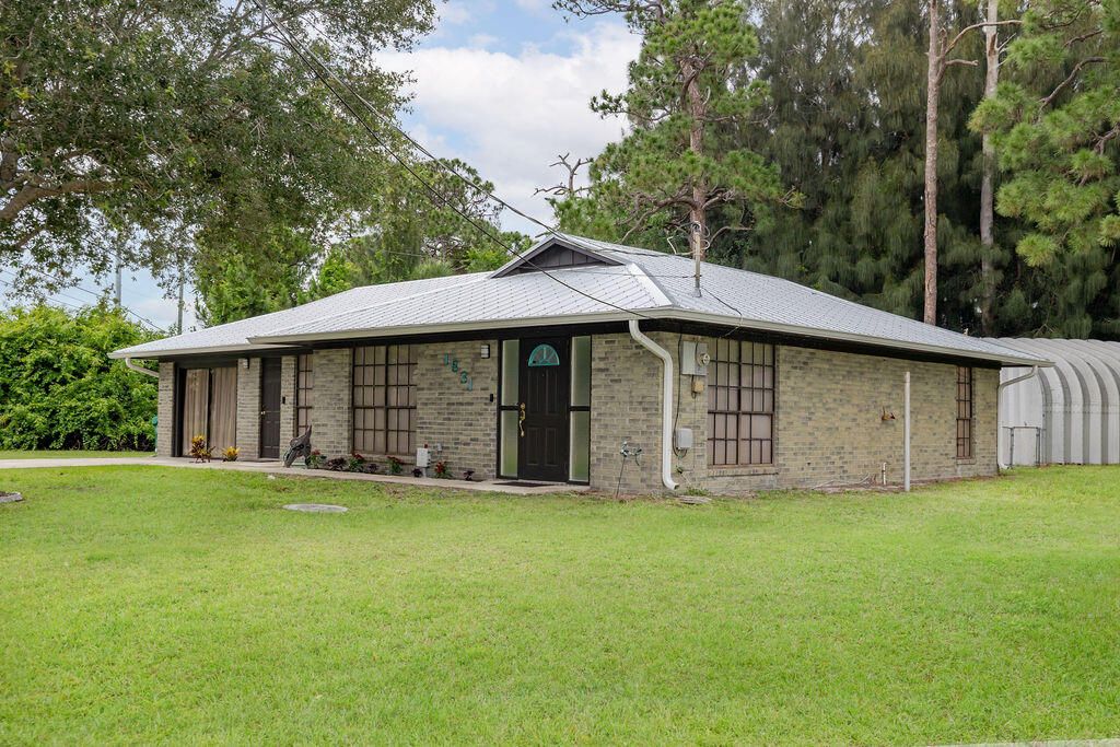 Photo of 1831 SE Lennard Road, Port Saint Lucie, FL 34952 (MLS # B26035357)