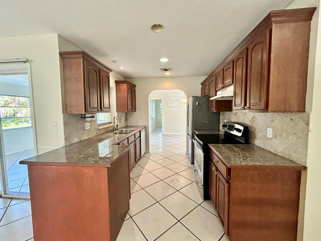 Photo of 2074 SE Doverbrook Street, Port Saint Lucie, FL 34983 (MLS # R11051693)