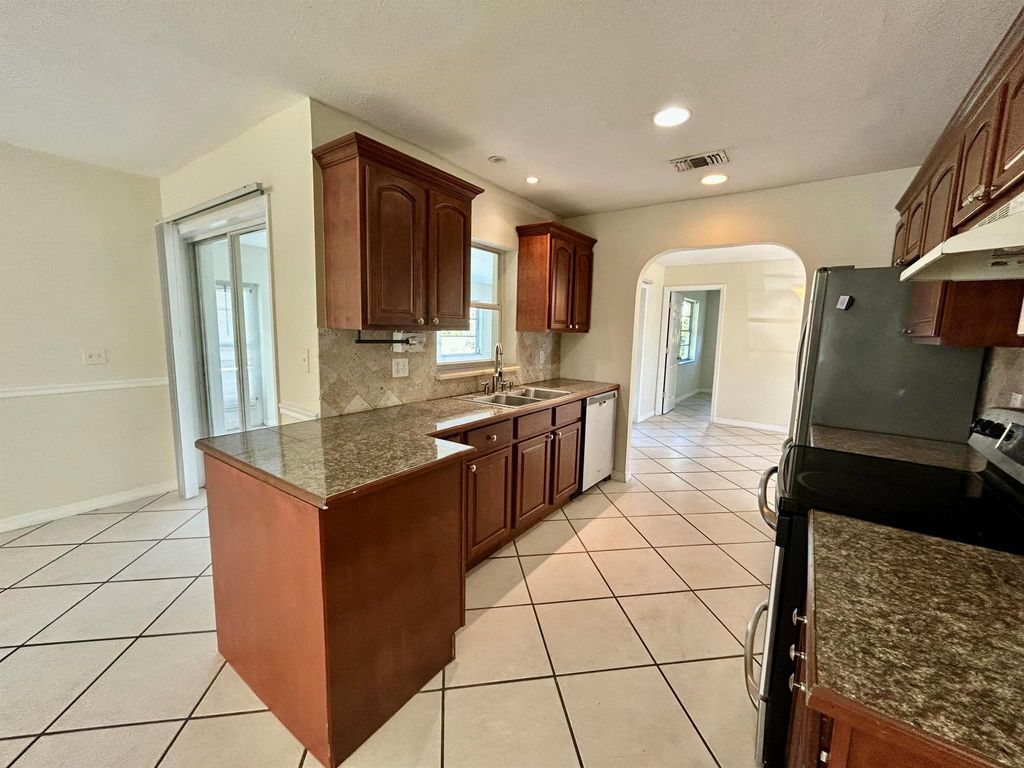 Photo of 2074 SE Doverbrook Street, Port Saint Lucie, FL 34983 (MLS # R11051693)