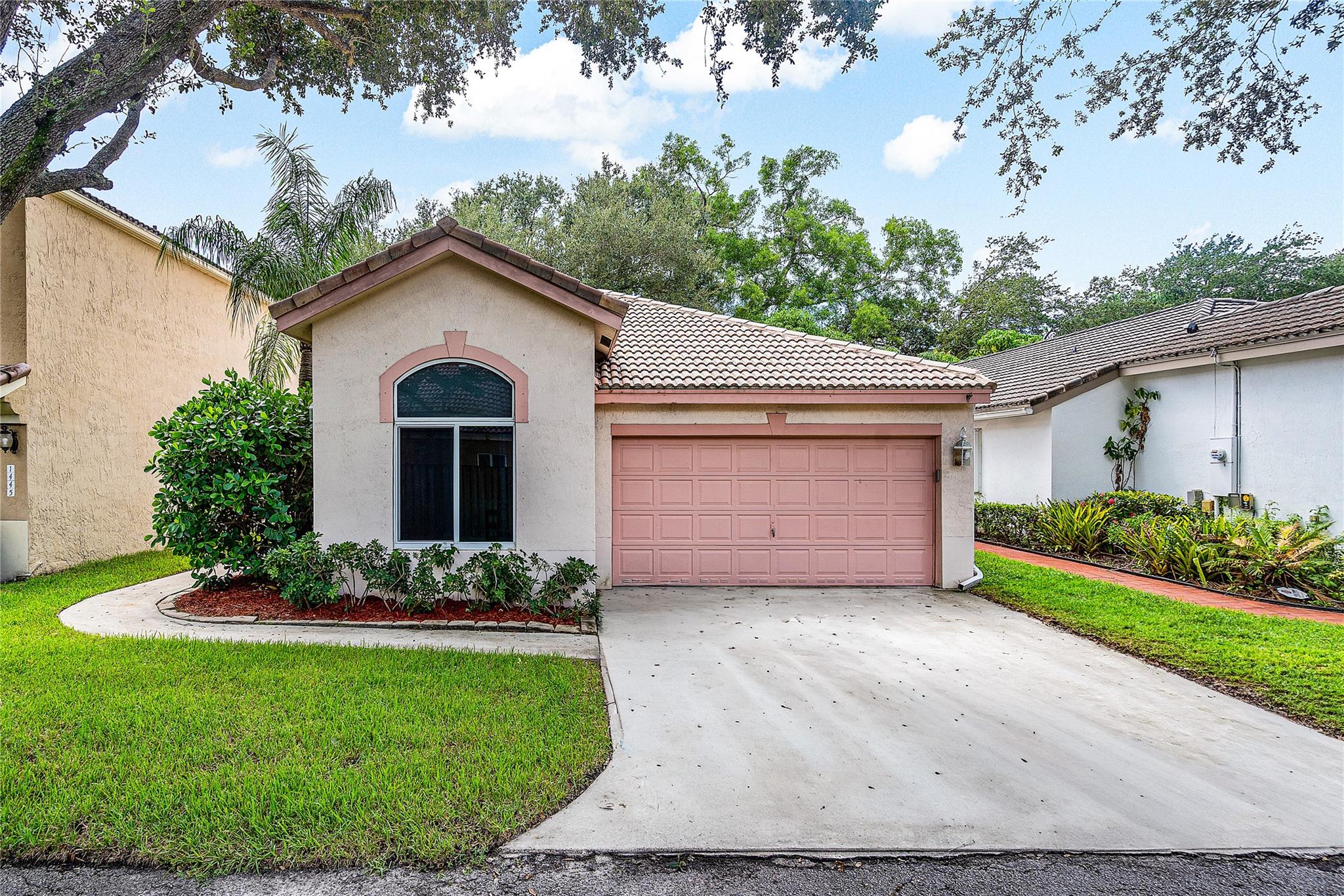 Welcome home to a tranquil three bedroom, two bathroom, two car garage located within well maintained Cypress Landings, which sits on the outskirts of Palm Aire. Several upgrades completed throughout property include kitchen, bathroom, impact windows, backyard deck, and much more. AC installed in 2024. Double strapped roof and solid poured concrete walls which improves isolation and reduces energy costs. Lovely community pool just steps away from the home. Conveniently located to private schools for kids, airports nearby, Turnpike and I-95 access within vicinity, and Tri-Rail station just east of the community. Contents within home included with sale, includes a generator in garage as well. Schedule showing today.