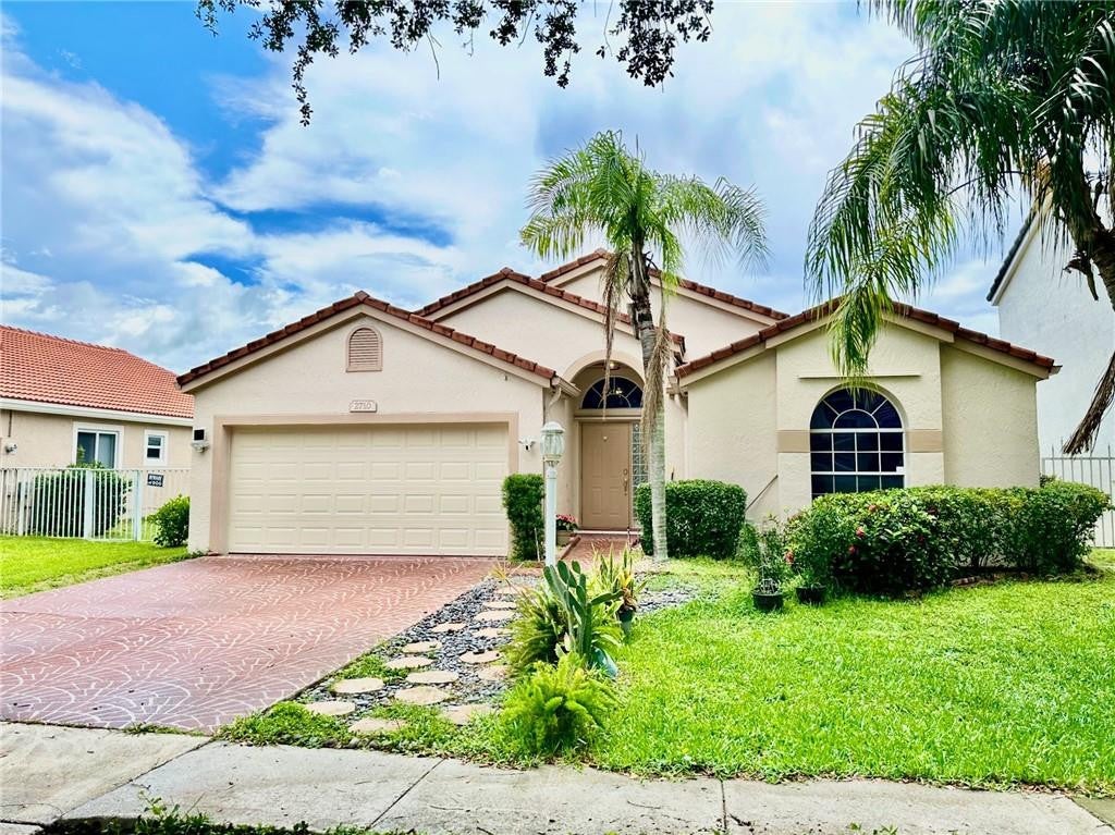 Photo of 2710 BOGOTA Avenue, Cooper City, FL 33026 (MLS # B26065210)