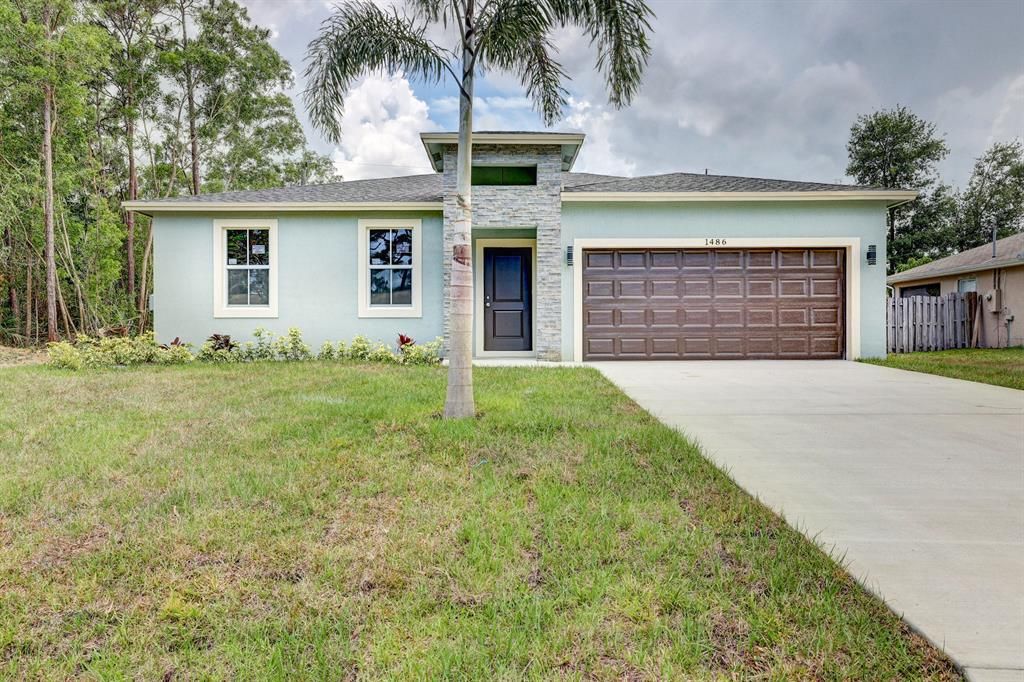 Photo of 1486 SE Proctor Lane, Port Saint Lucie, FL 34983 (MLS # R10715712)