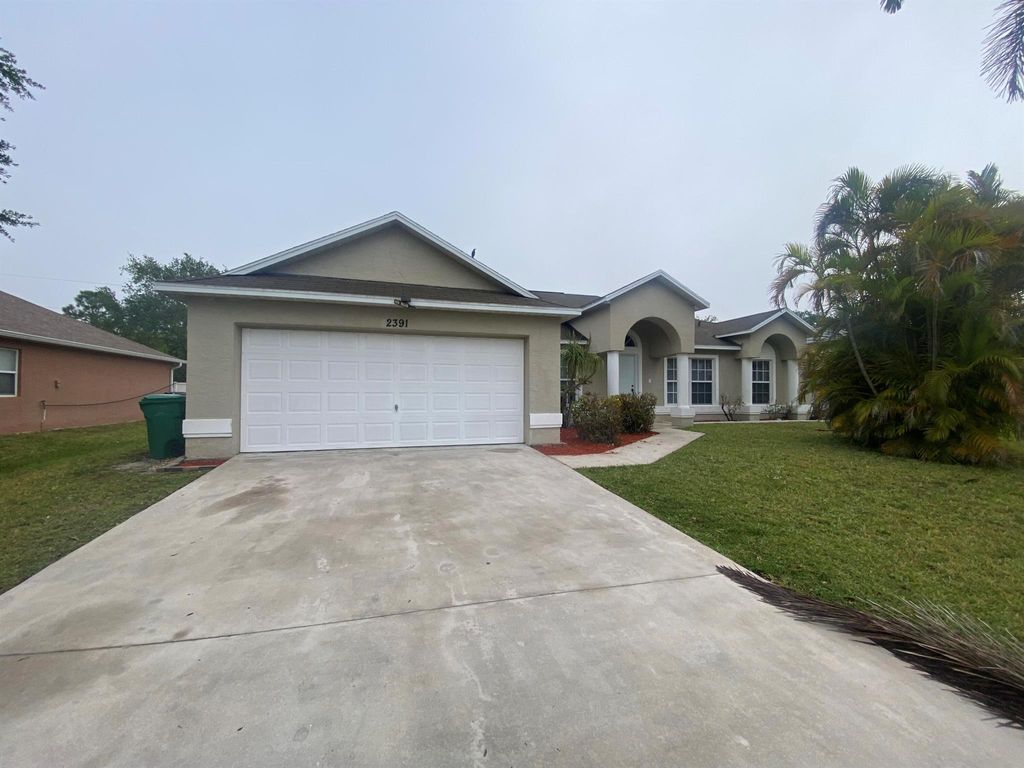 Photo of 2391 SW Santana Avenue, Port St Lucie, FL 34953 (MLS # R11077042)