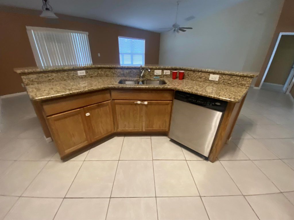 Photo of 2391 SW Santana Avenue, Port St Lucie, FL 34953 (MLS # R11077042)